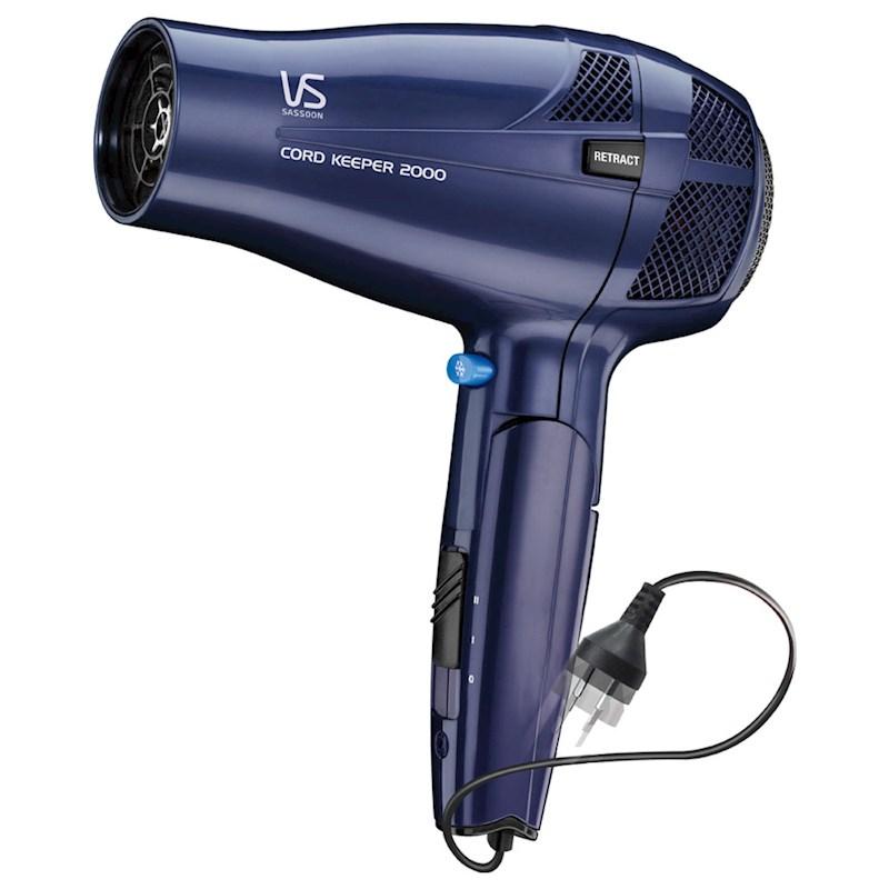 Blow dryer with retractable cord clearance